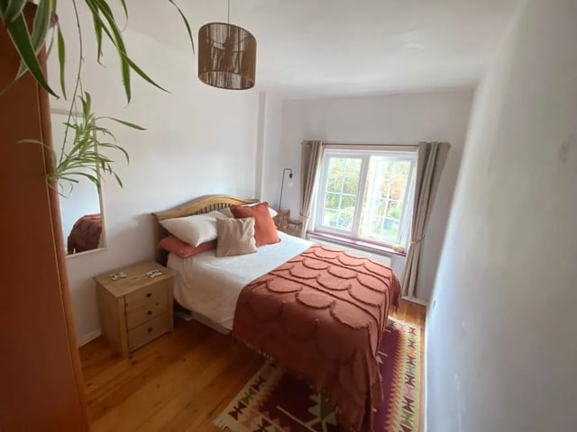 Private guest bedroom with a double bed